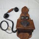 Old wood and metal wall phone