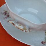 Sauce boat on dormant white porcelain, floral decoration