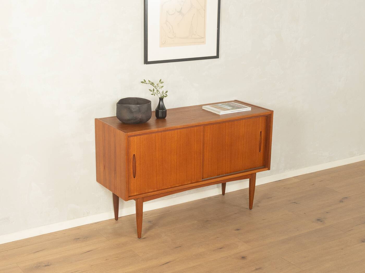 Elegant sideboard from the 1960s, minimalistic with practical storage space