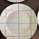 Vintage Longchamp France service – 18 graphic plates from the 1950s.