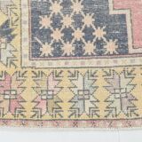 Tapis persan vintage rouge et jaune