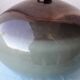 Green and brown ceramic vase