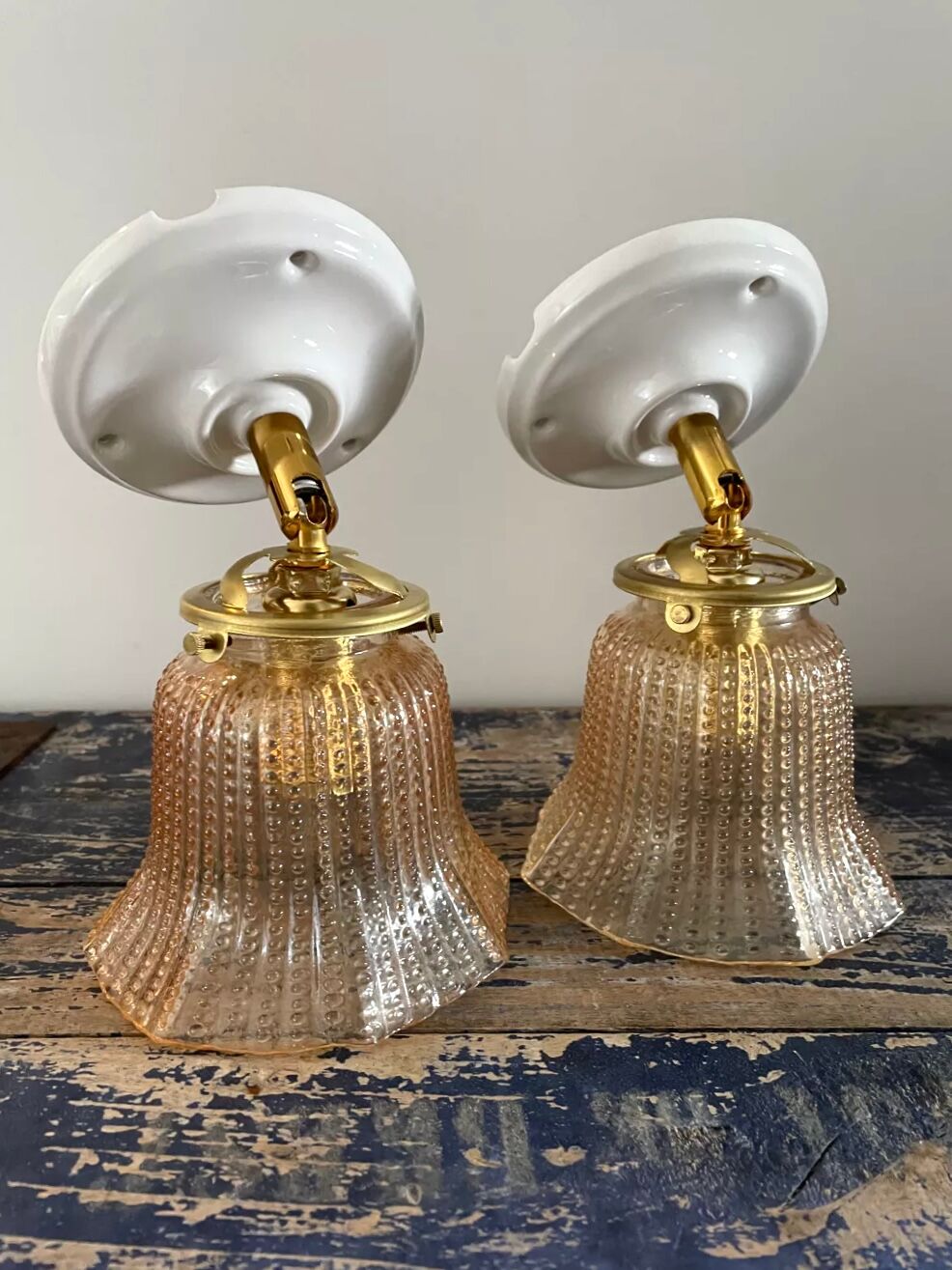 Pair of vintage sconces in electrified gold chiseled glass