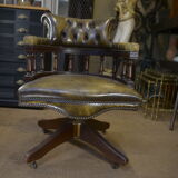 Rotating office chair in mahogany and upholstered leather, from the 1960s