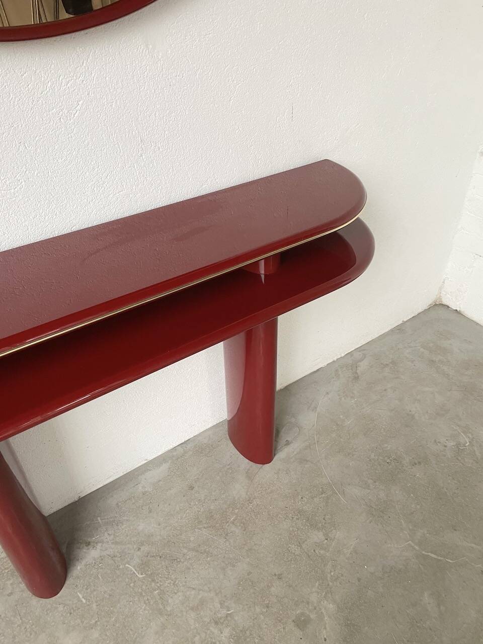 Red lacquered console and its mirror from the 80s