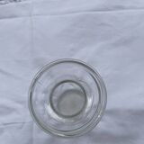 Small glass vase with leaf pattern.