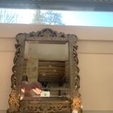 Eventful beveled mirror and openwork period 1900 repelled tin decoration