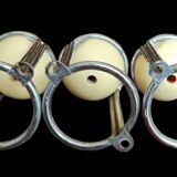 3 designer metal and wood coat hooks