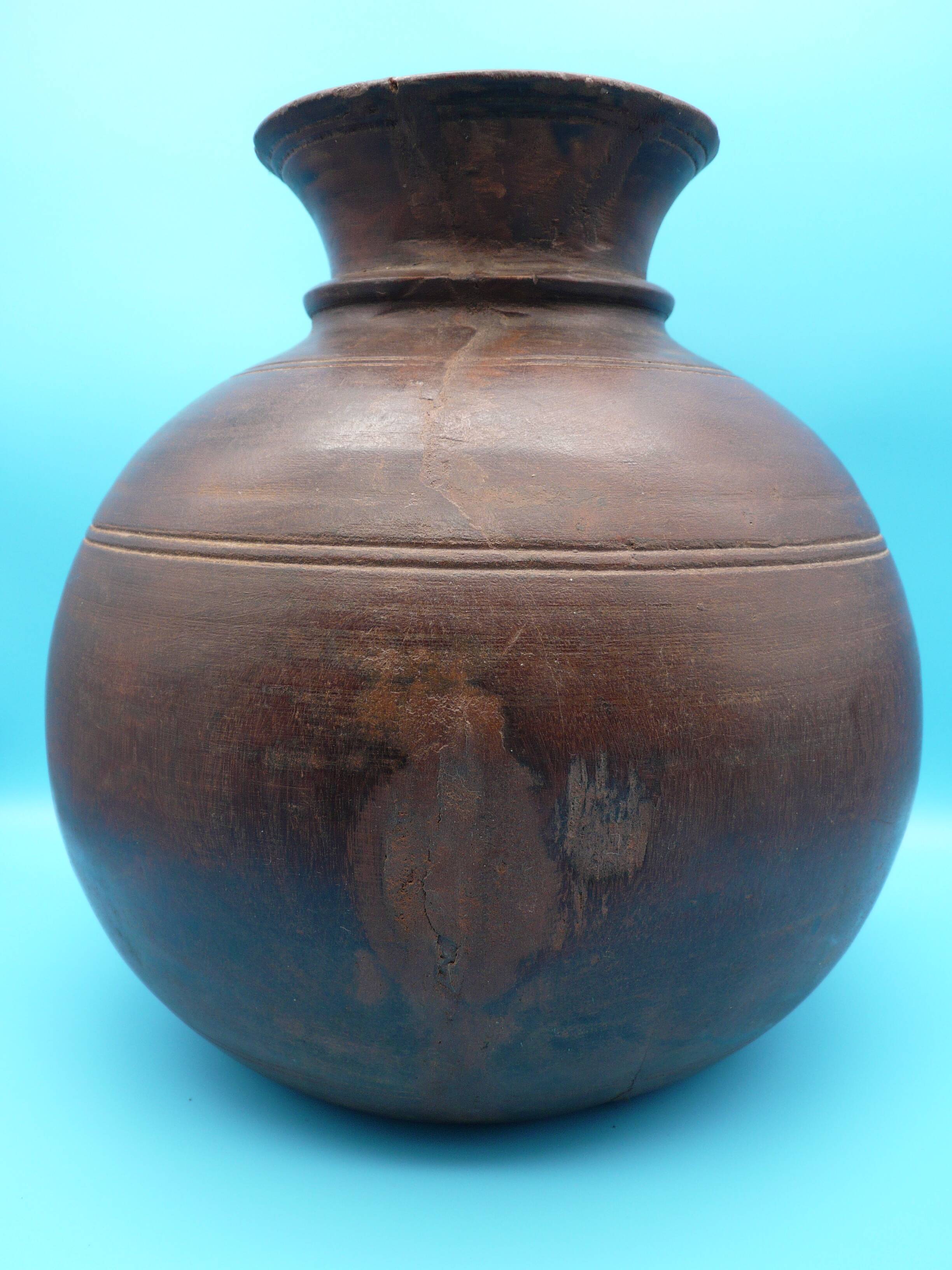 Large carved wooden pot / India