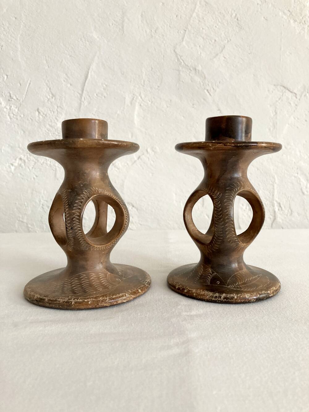 Pair of soapstone candlesticks, Kenya