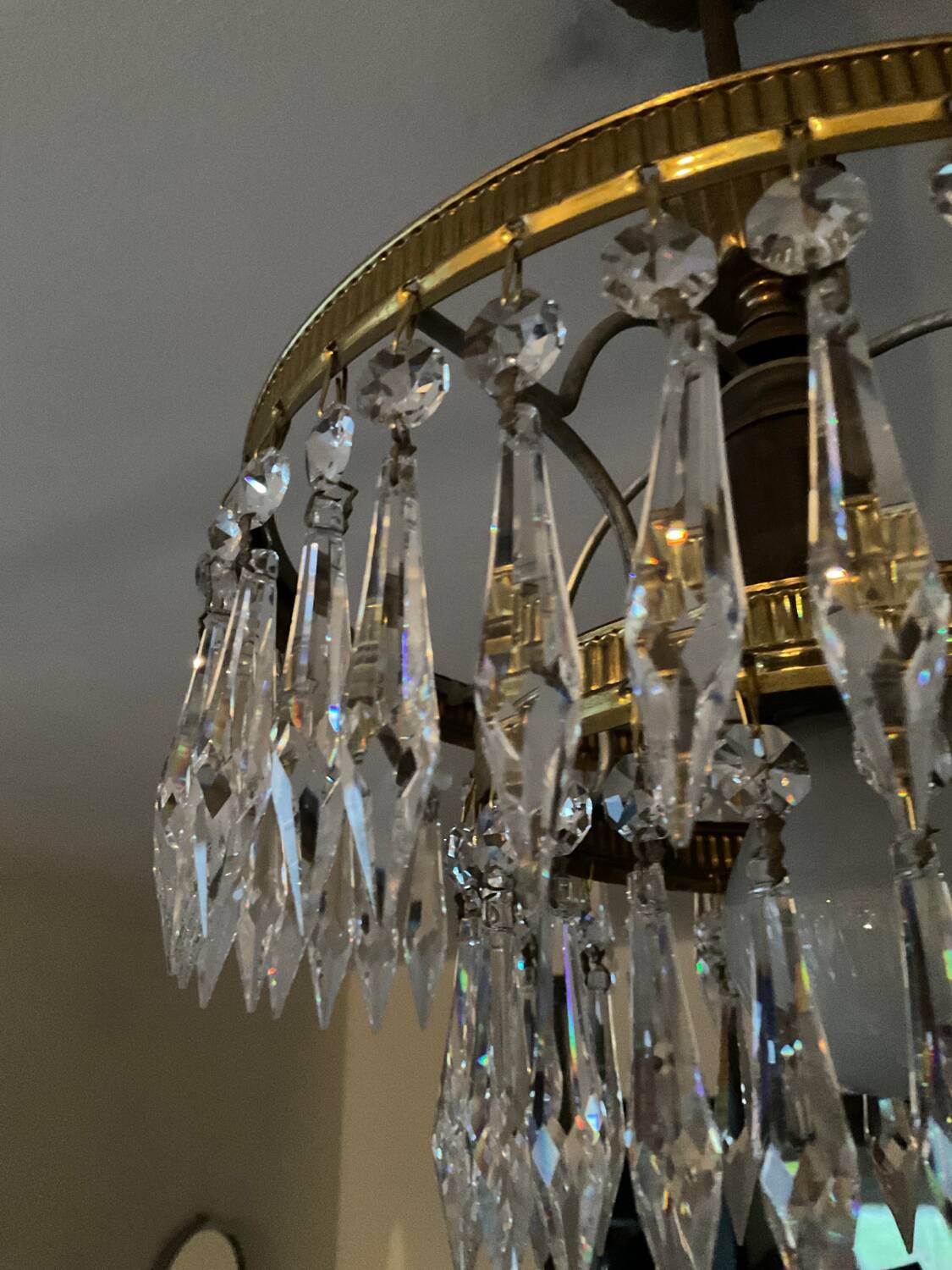 Cascade chandelier with crystal and brass tassels