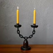 Sculpted wooden and wrought iron brutalist double chandelier from the 1960s.