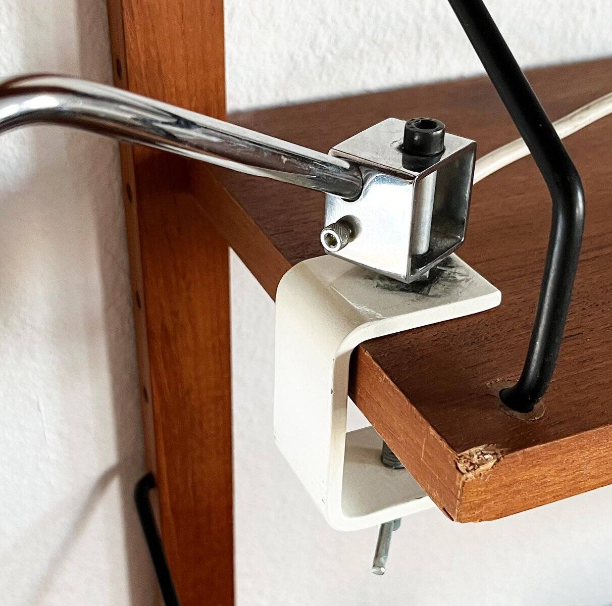 Mid-century minimalist Swiss table lamp with a clamp by Rosemarie and Rico Baltensweiler for Baltensweiler, 1950s.