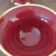 Tea, coffee and sugar cups made of red and gold porcelain