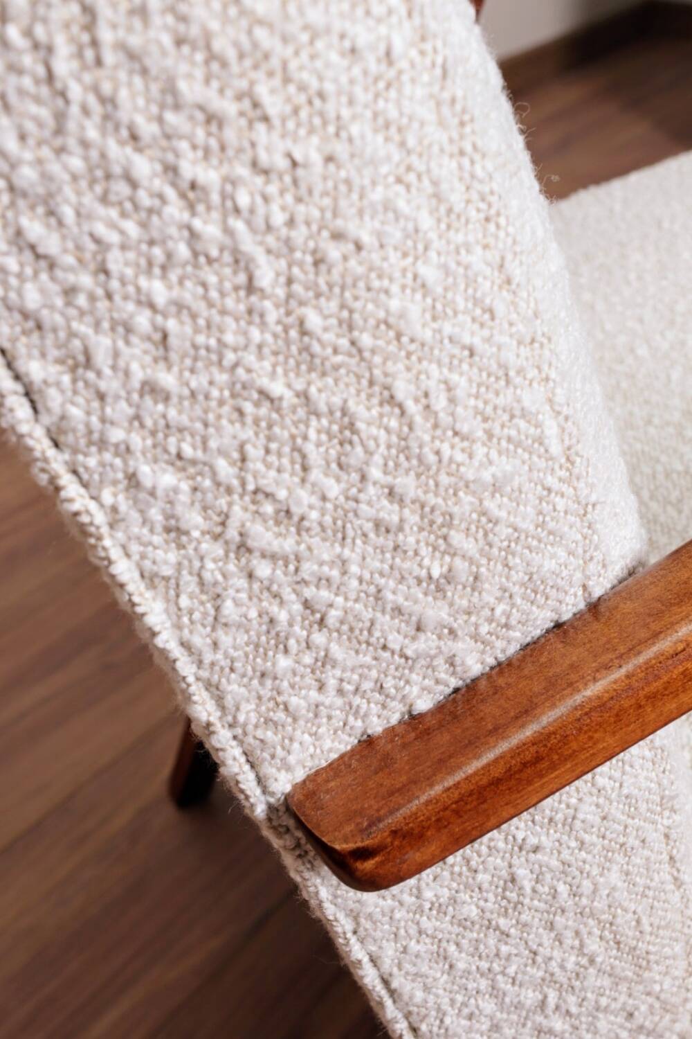 Vintage armchair in pearl white bouclé with walnut wood, 1960.