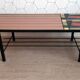 Vintage coffee table in ceramic, wood, and metal.