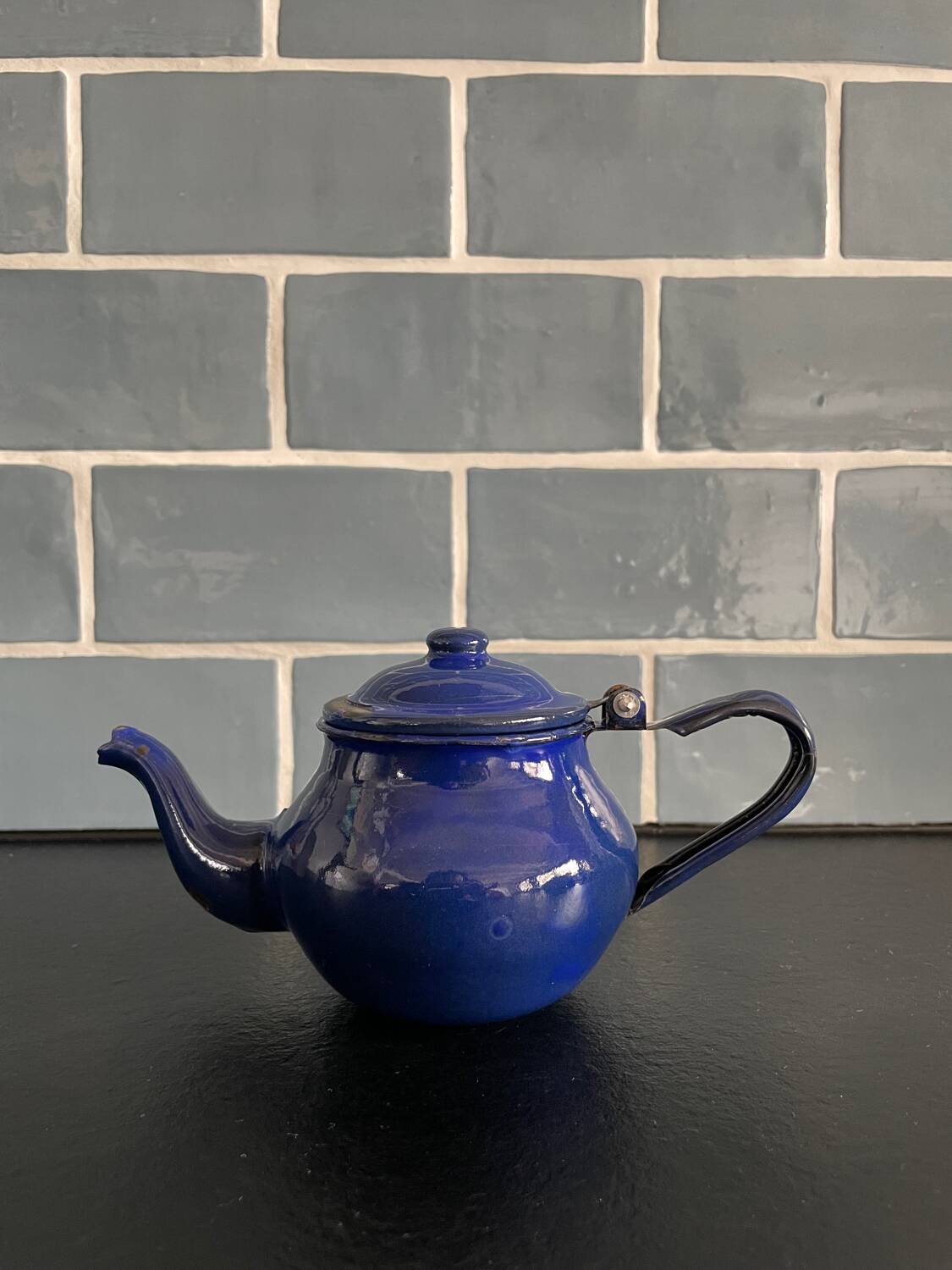 Mini blue enamelled sheet metal teapot
