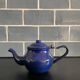 Mini blue enamelled sheet metal teapot