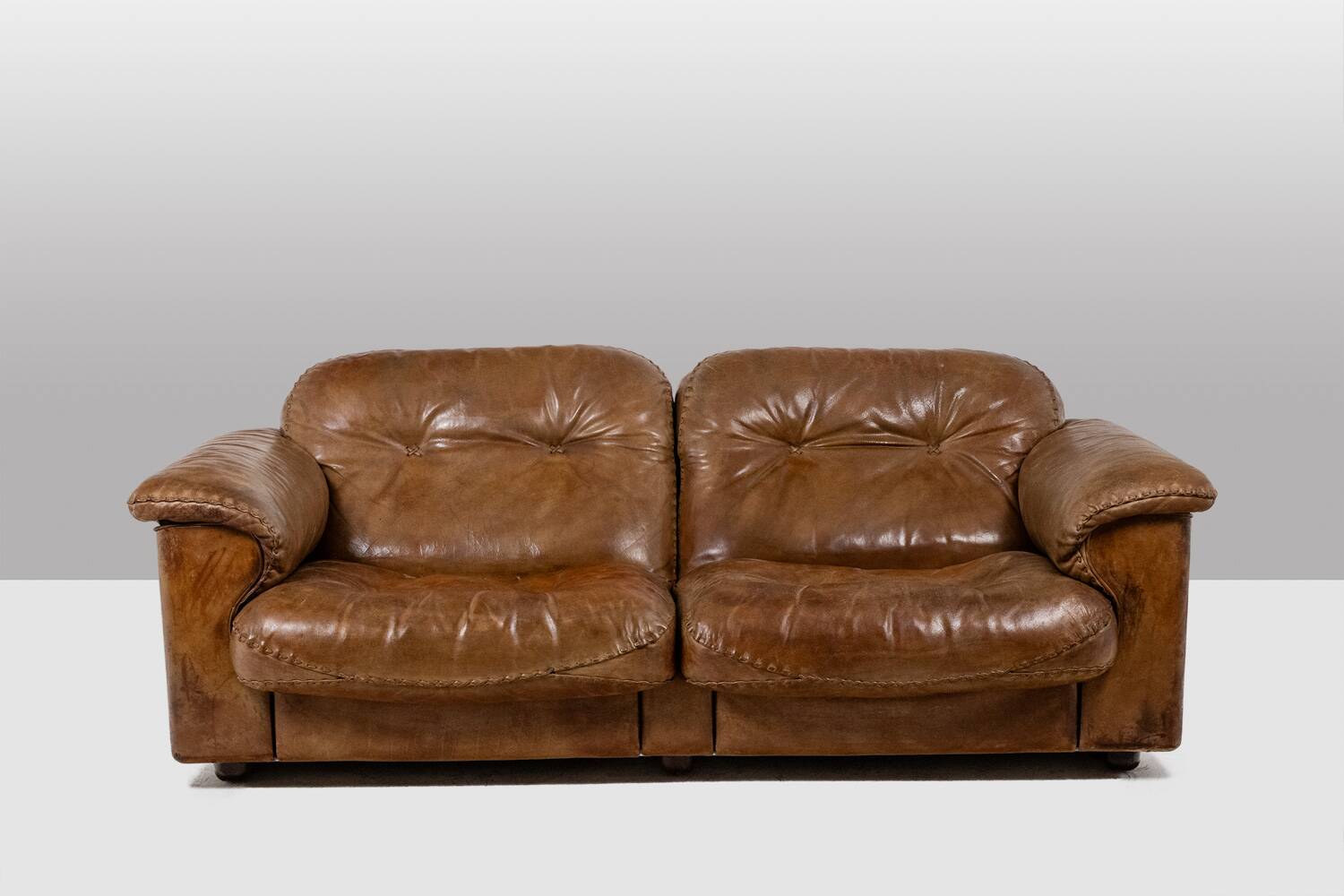 Maison De Sede. Two-seater sofa in buffalo leather. 1970s.