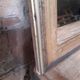 Old mirror of period handmade by cabinetmaking and decorated with gold leaf