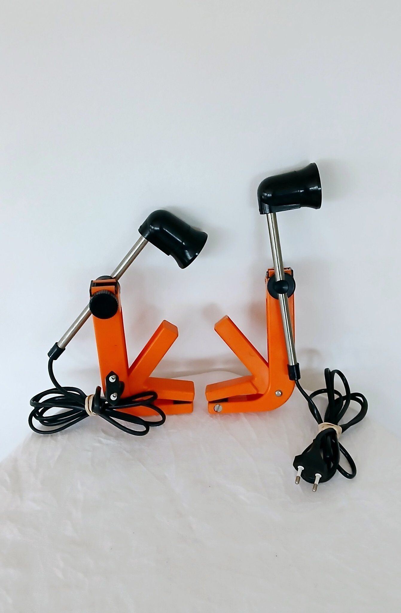 2 orange clamp lamps by revue, 1970
