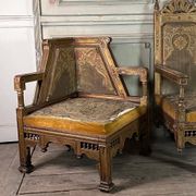 Pair of corner armchairs and an Orientalist bench in carved and polychrome wood from around 1900.