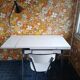 Extendable formica table and vintage 1960s chairs.