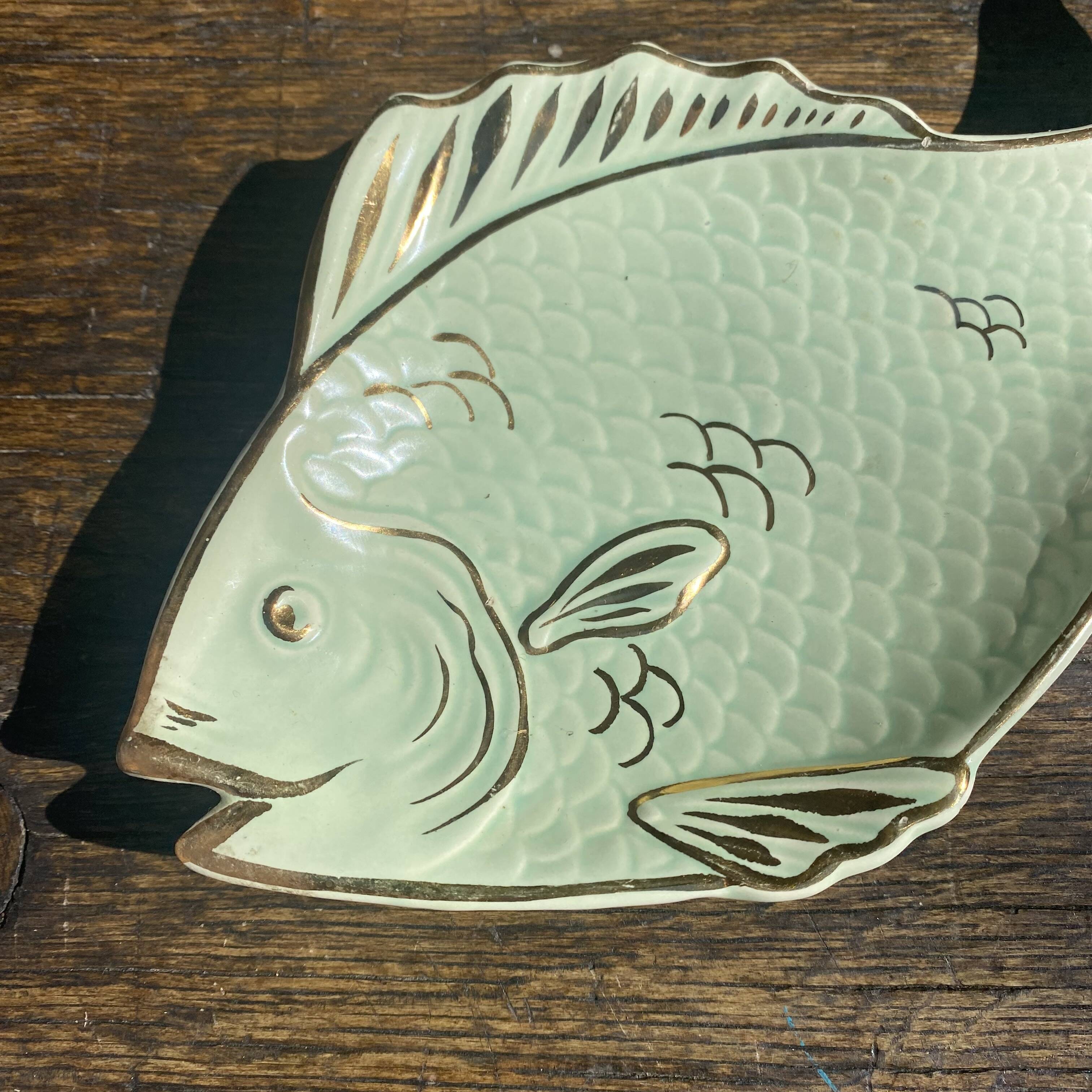 Small fish dish, pocket emptier.