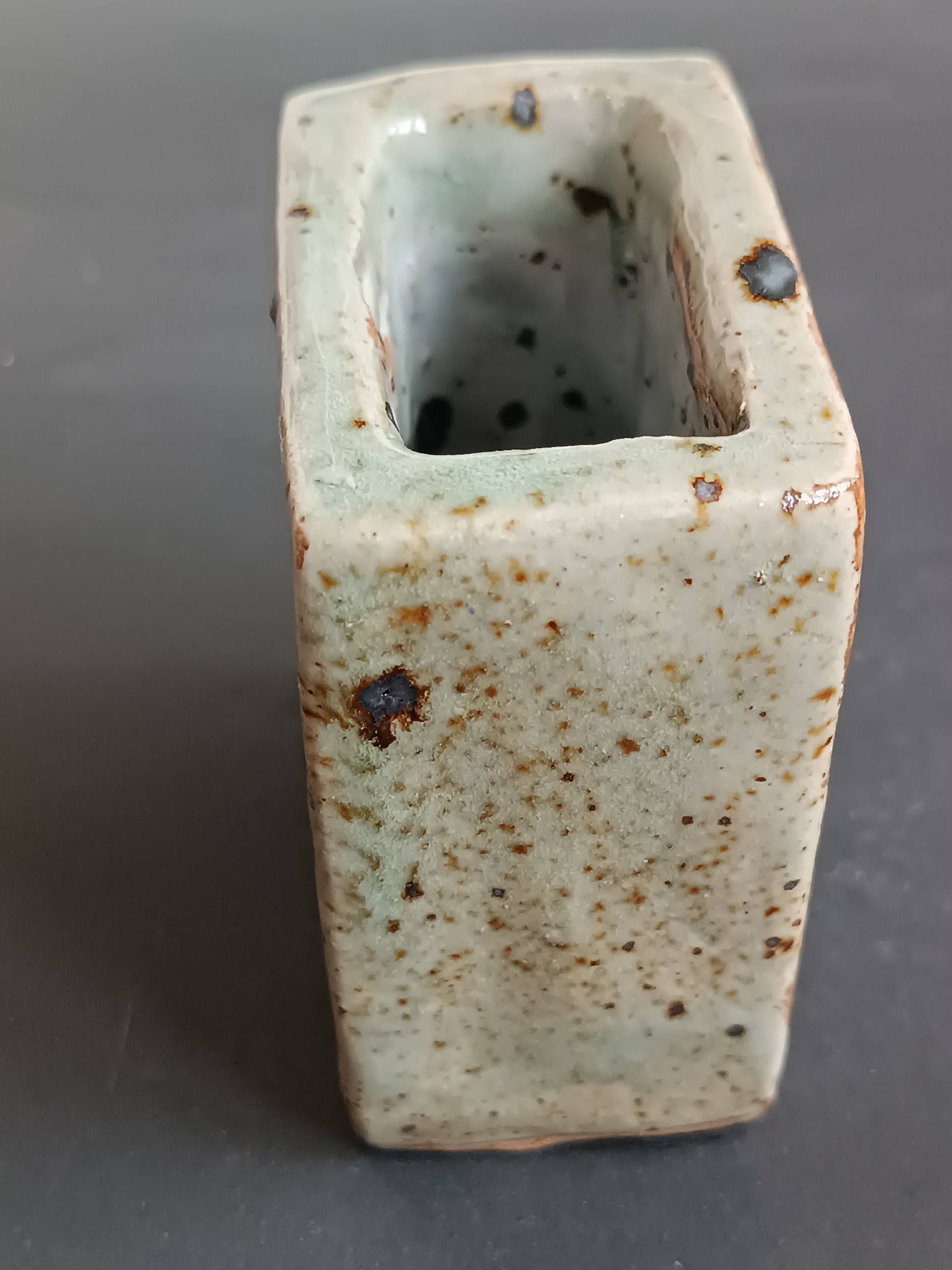 Pyrite stone vase with blue thistle decoration by Suzanne Dauliach, vintage.