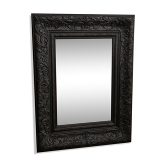 Large black baroque mirror carved in wood