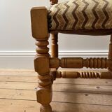 Pair of wooden chairs with herringbone fabric