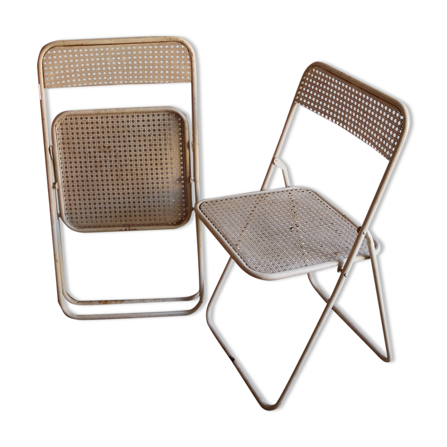 Two metal tanned folding chairs