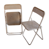 Two metal tanned folding chairs