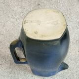Blue glazed ceramic pitcher