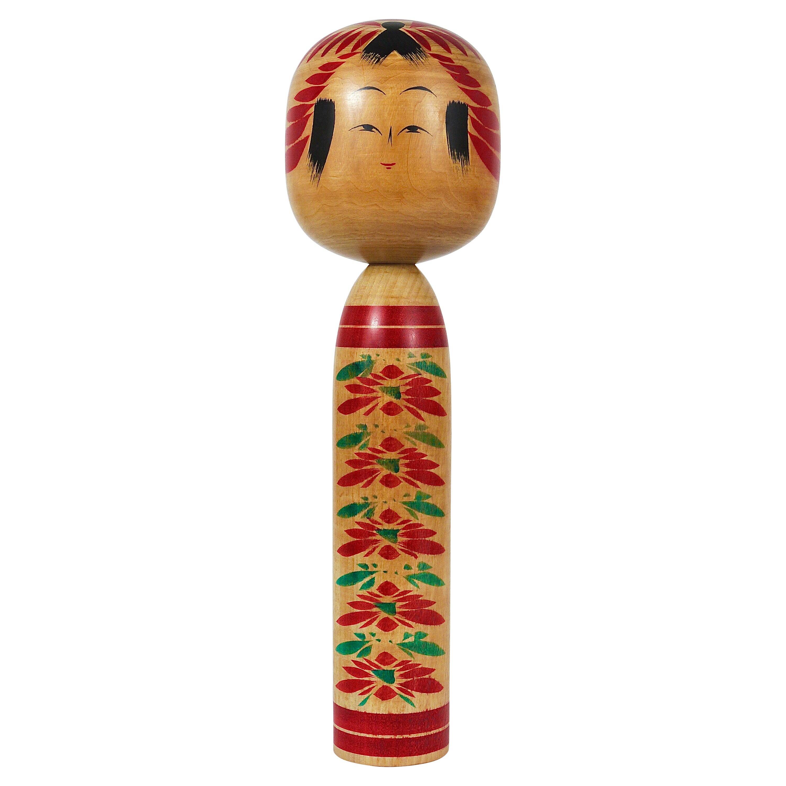 Decorative Togatta Kokeshi doll sculpture from northern Japan, hand-painted.