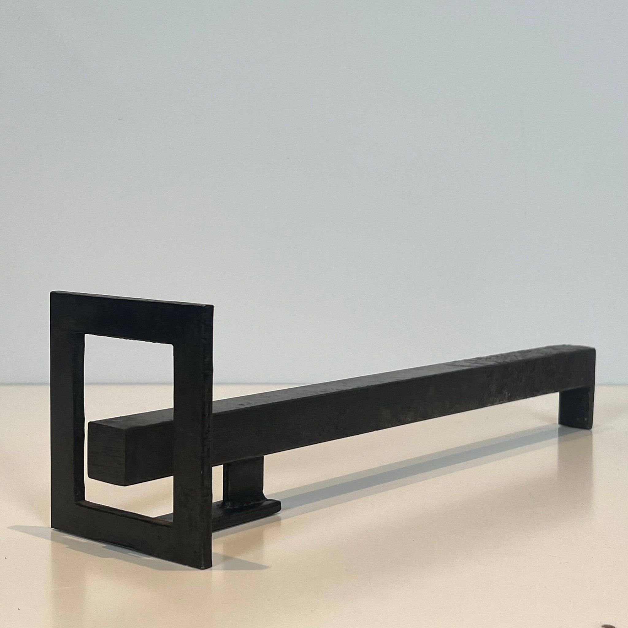 Paire de chenets modernistes en acier et fer forgé