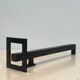 Pair of modernist andirons in steel and wrought iron