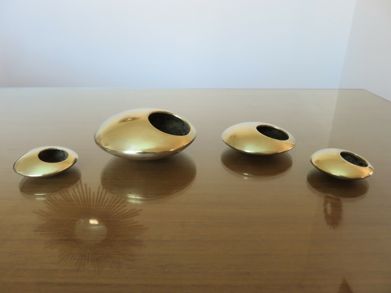 Series of 4 Scandinavian "pebble" ashtrays in bronze 70s