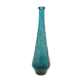 Bouteille bleue en verre pressé à décor de fleurs