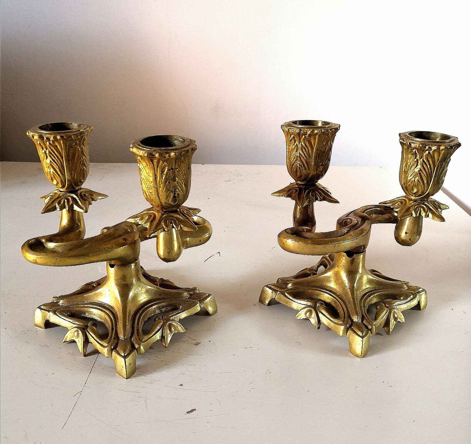Pair of art nouveau design candlesticks in bronze