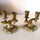 Pair of art nouveau design candlesticks in bronze