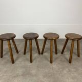 4 wooden tripod stools