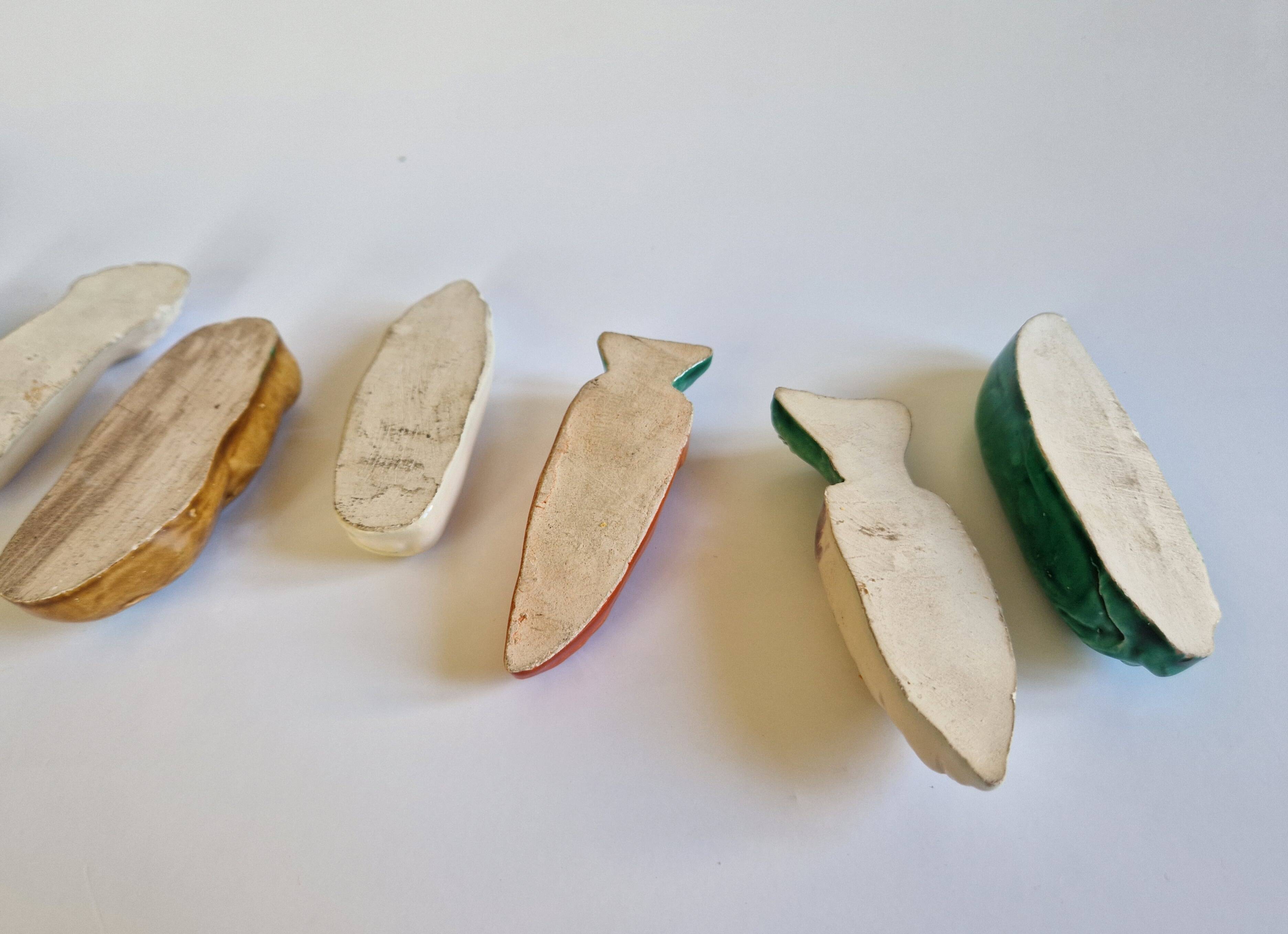 Set of 9 vintage ceramic vegetable knife holders
