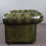 Spacious Chesterfield armchair in green patina