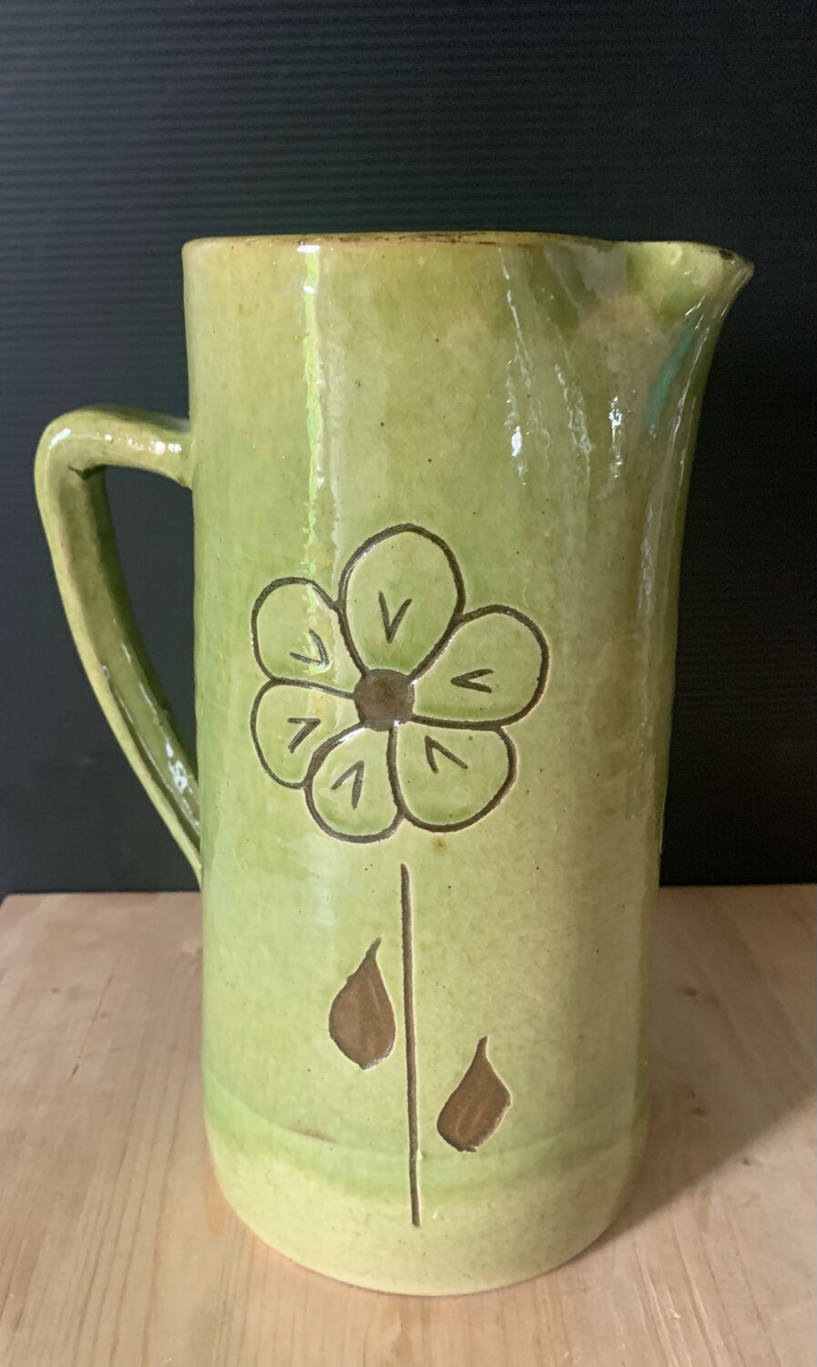 Green ceramic pitcher