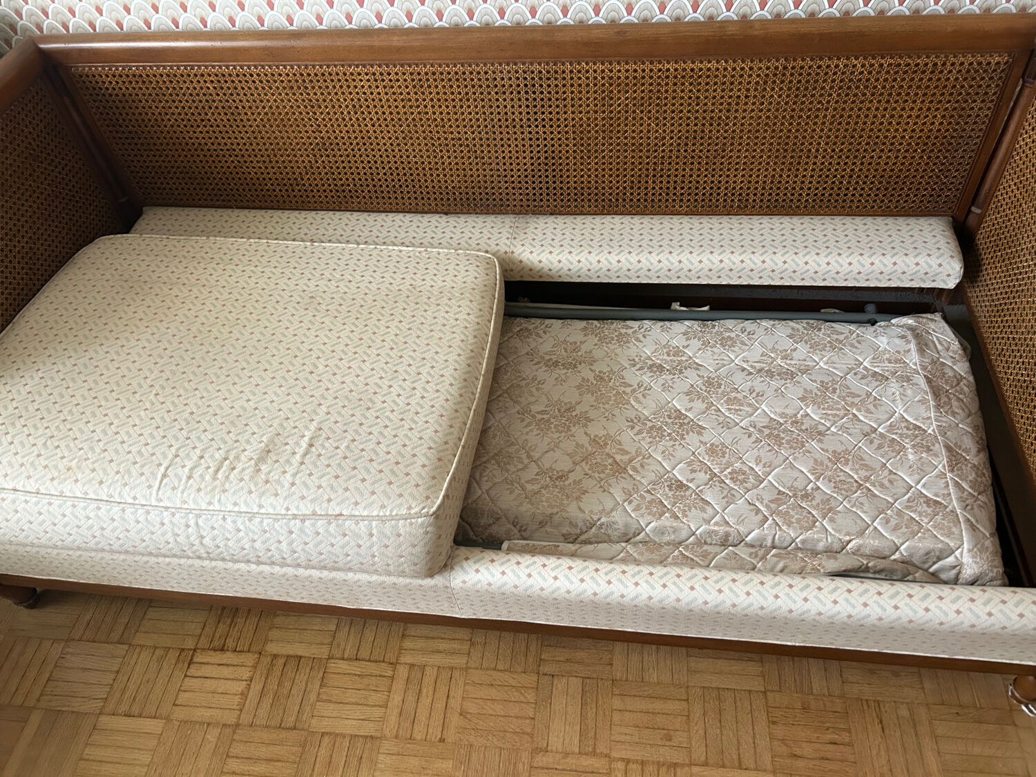 Vintage convertible wooden and cane sofa