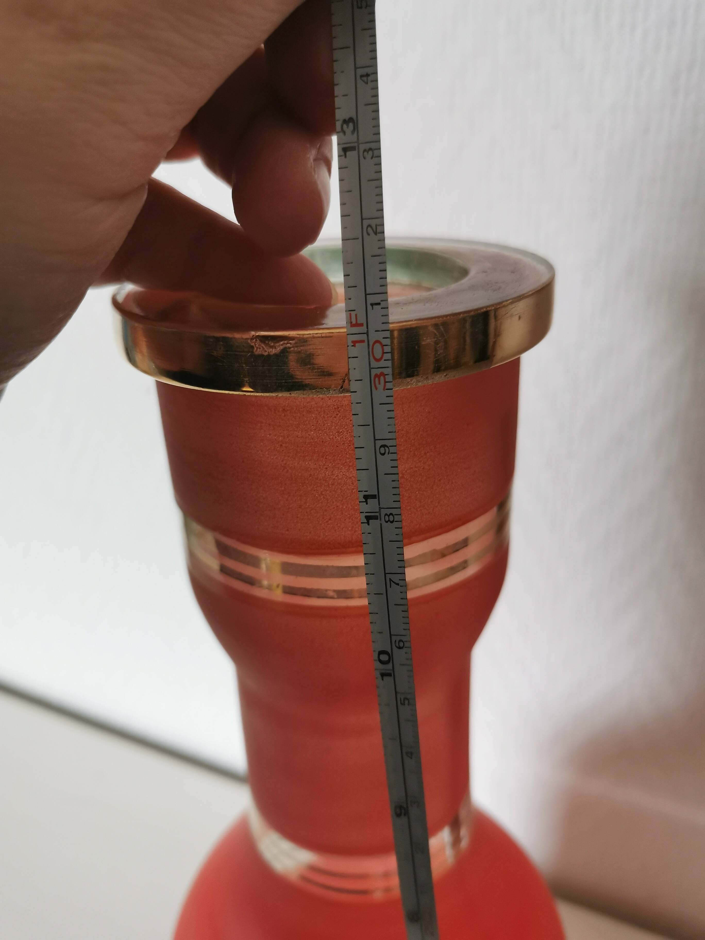 painted glass vase, red and gold granite appearance