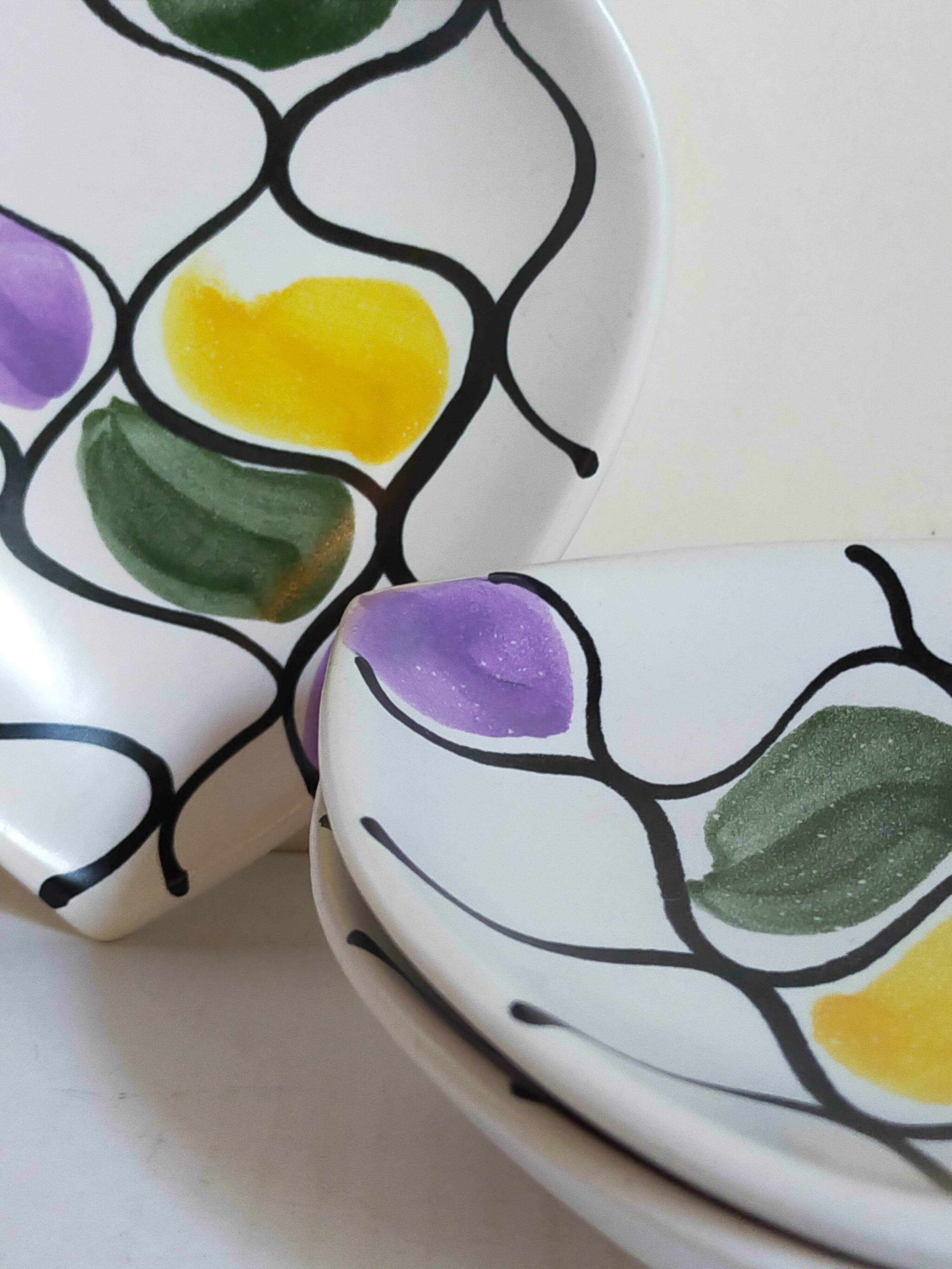 Three vintage free-form ceramic ravine dishes from the 1950s