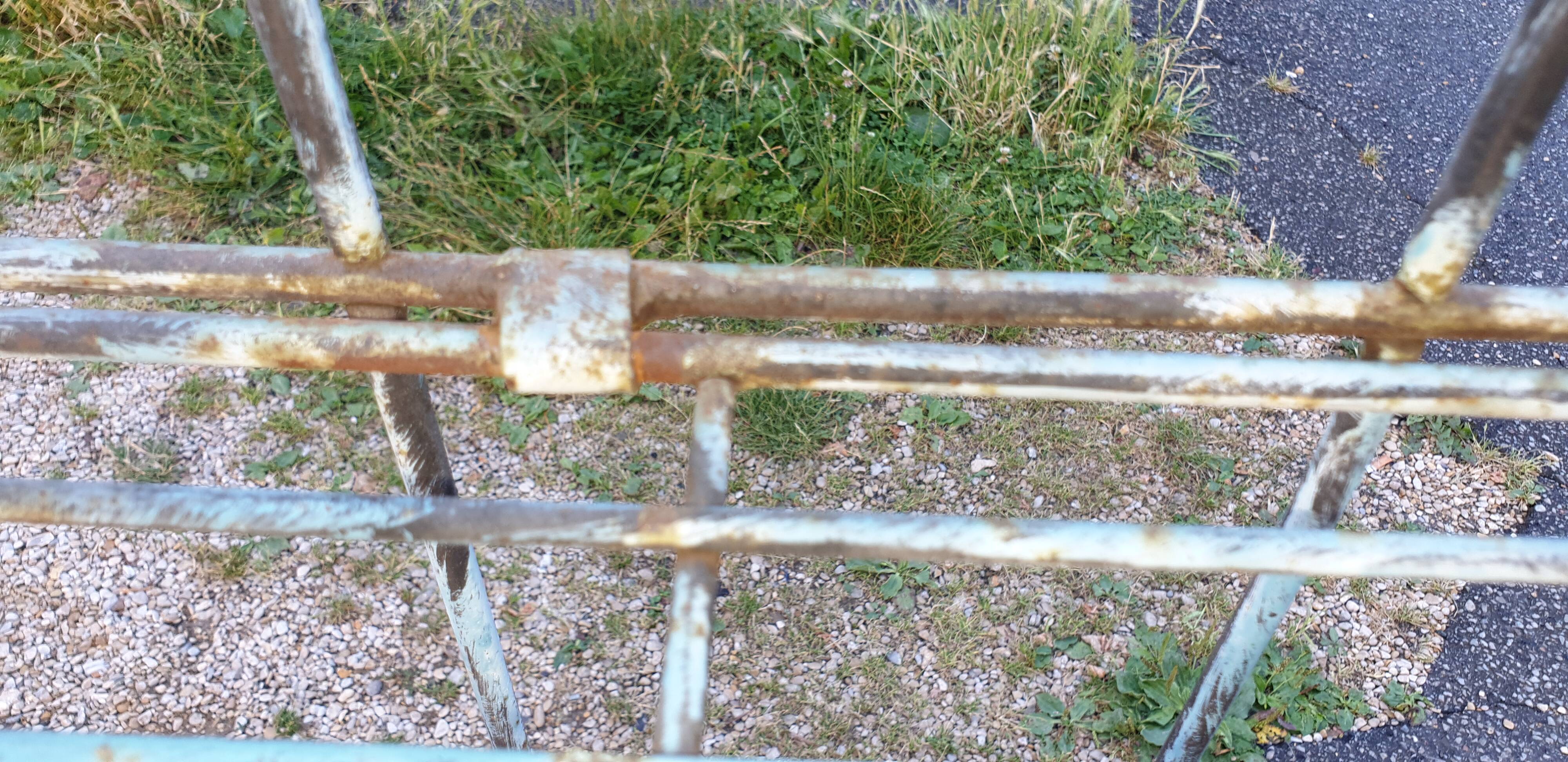 Wrought iron shelf on worked feet