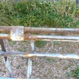Wrought iron shelf on worked feet
